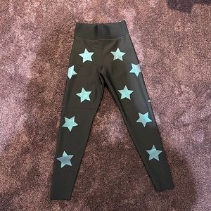 Ultracor black leggings with stars. Barely worn! Size small.